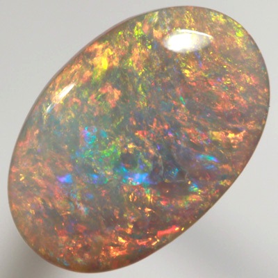 SOLID SEMI BLACK OPAL Top quality. Floral Harlequin pattern, very bright and sparkling golden multicolour. SEE VIDEO  